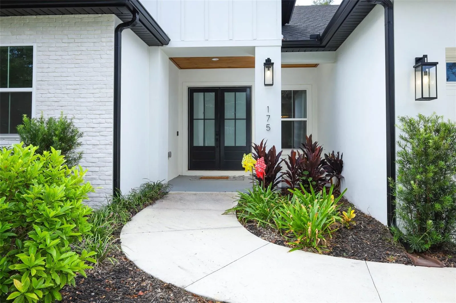 Entry with view of tongue & groove ceiling
