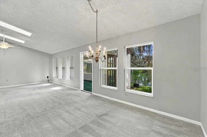 Dining area looking into living room