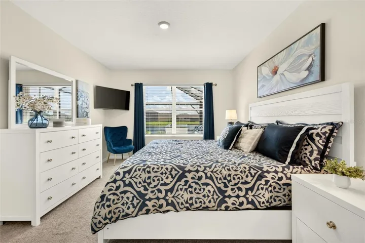 Primary Bedroom with view to pool
