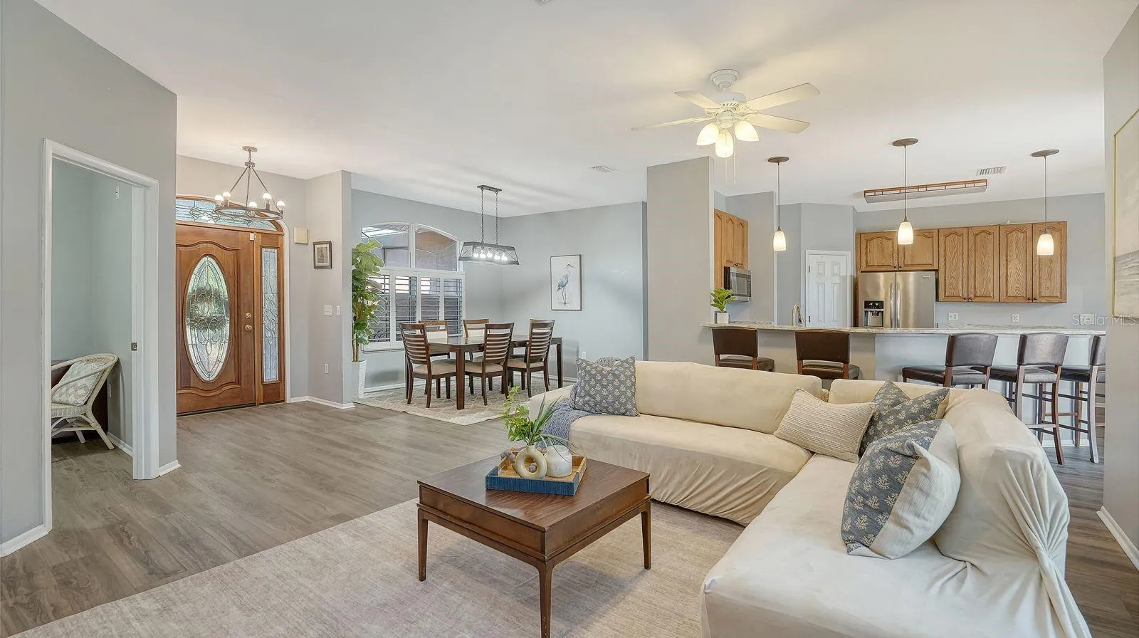 Open Floor Plan of Great Room, Formal Dining & Kitchen