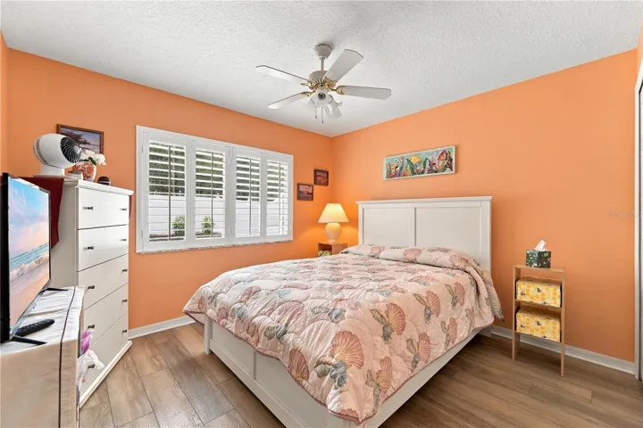 2nd bedroom with luxury vinyl plank flooring