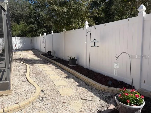 White vinyl fencing and more low maintenance yard