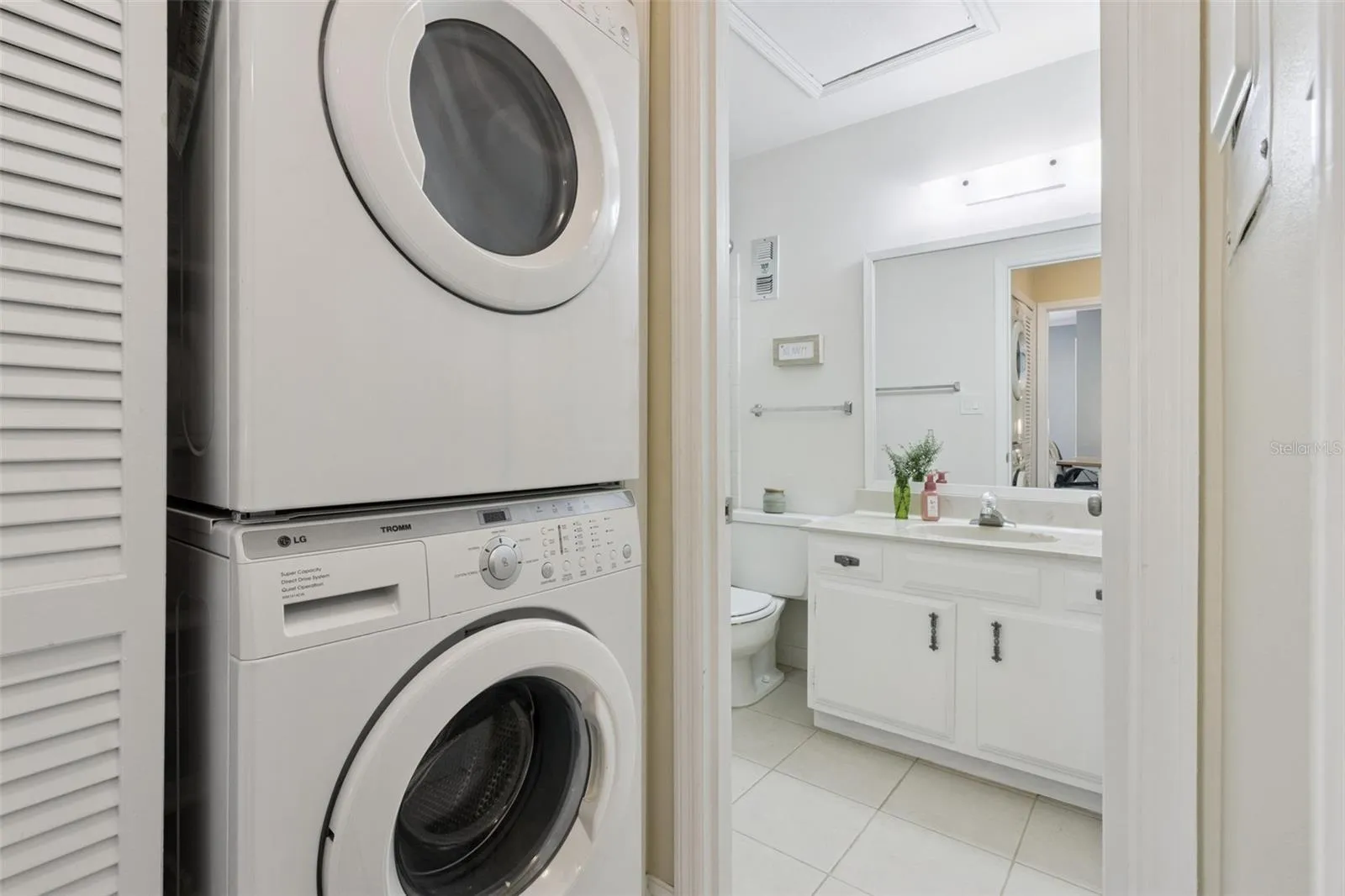 Washer/dryer closet is conveniently inside the home.