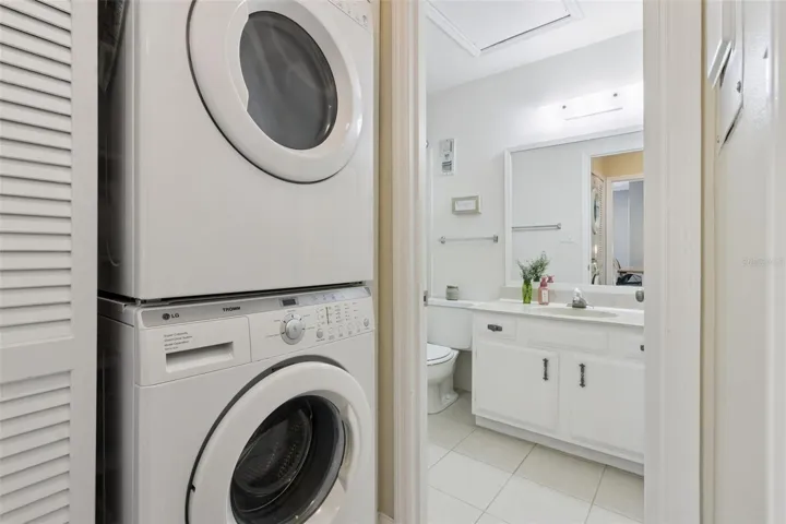 Washer/dryer closet is conveniently inside the home.