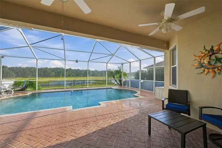 Lanai/pool and covered area offer WATER VIEWS!