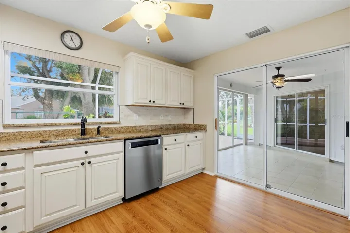 Kitchen Sliders Lead to Sunroom