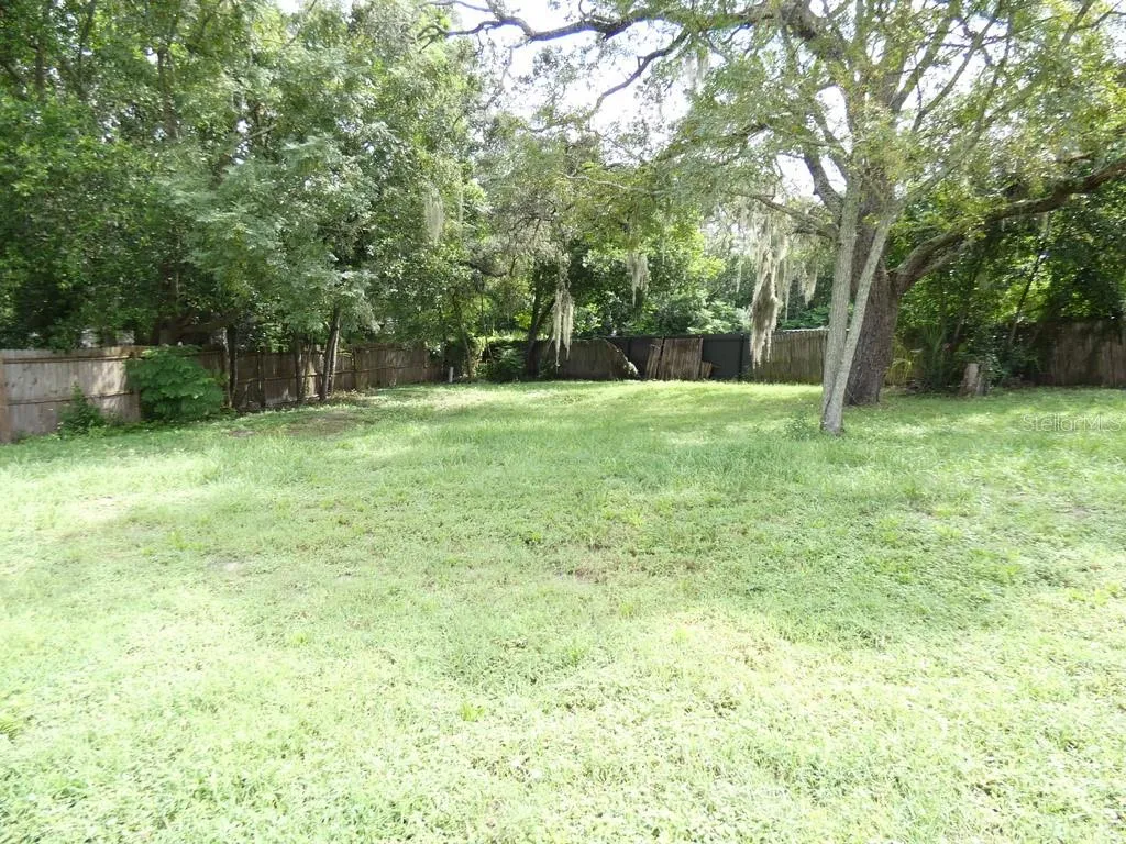 Completely fenced backyard