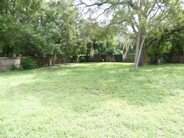 Completely fenced backyard