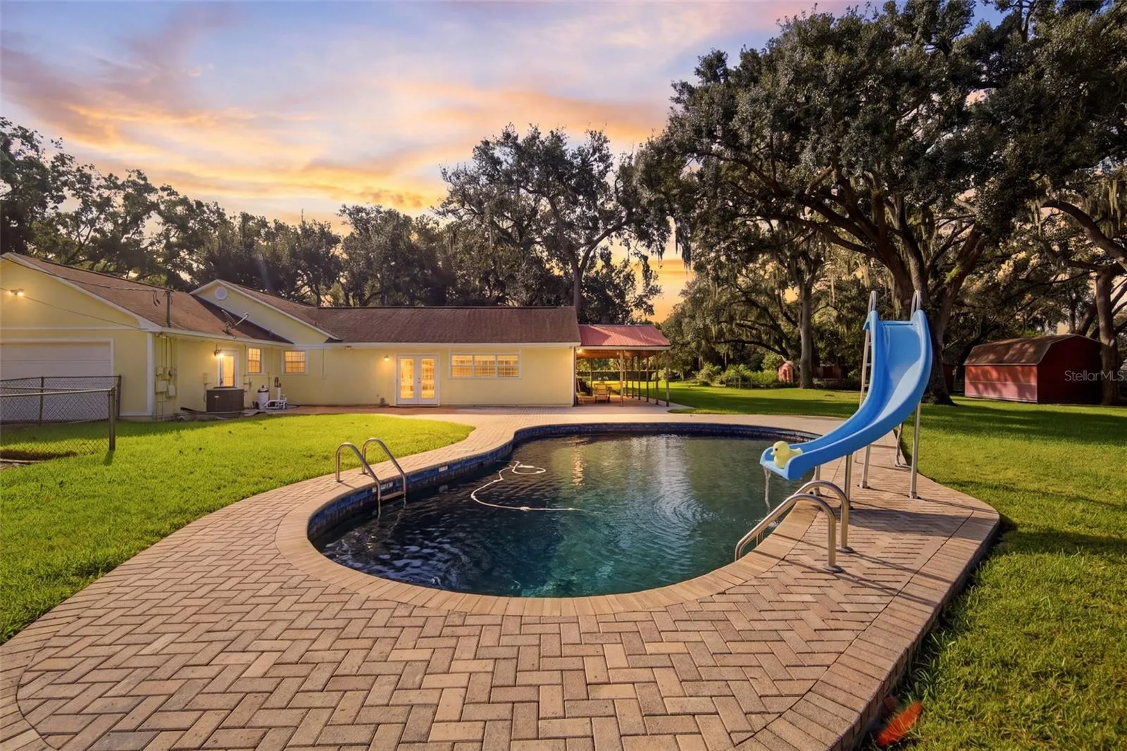Open Air pool with brick pavers