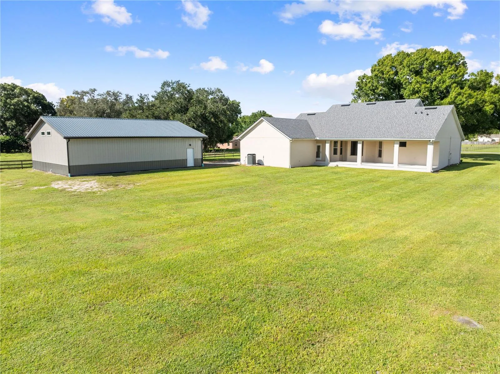Exterior View of the home and Detached Garage - Plenty of room for pool and entertaining area.