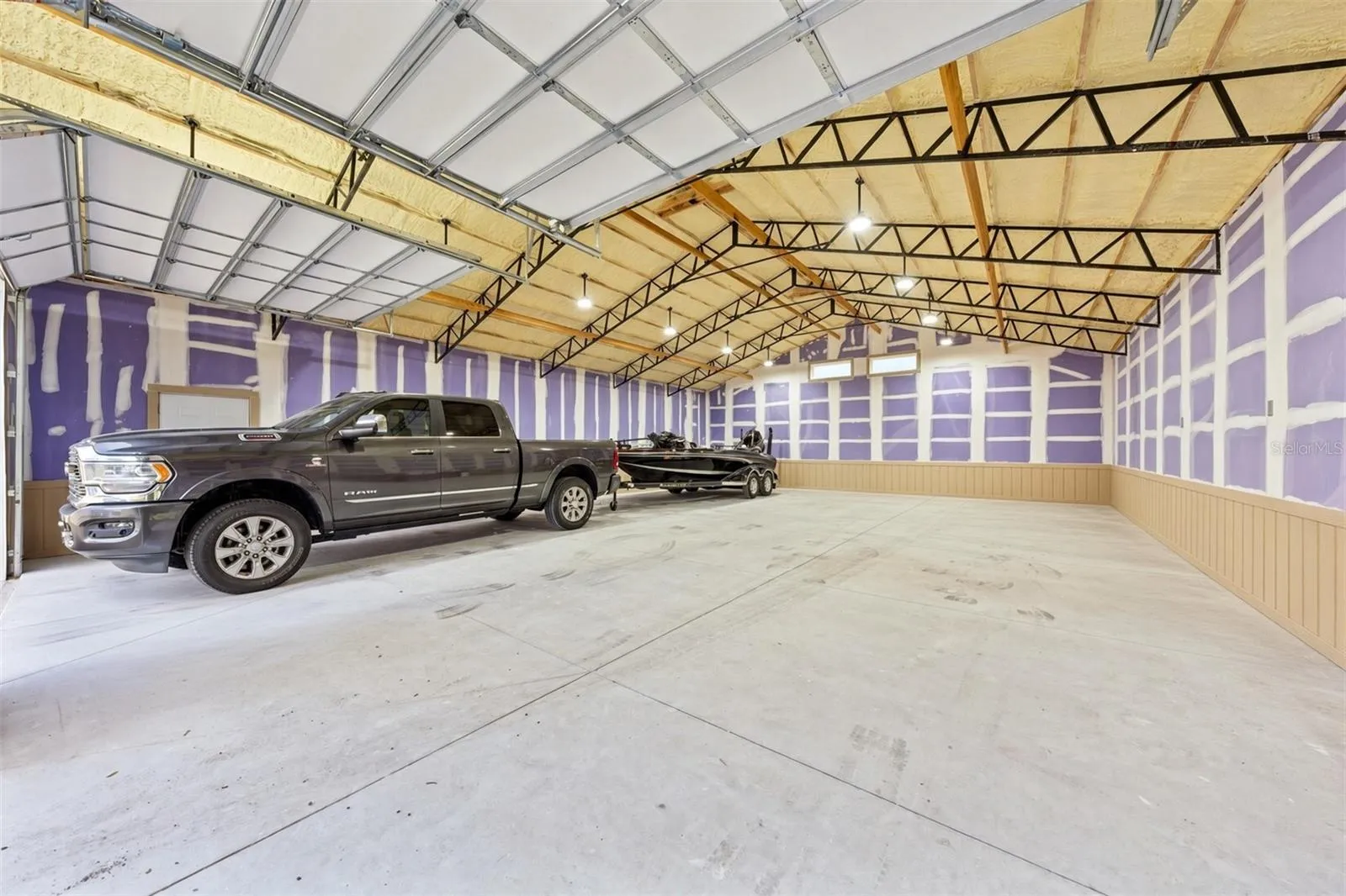 36' x 48' Interior of the Detached Garage with 2 Bay Doors and side entry door