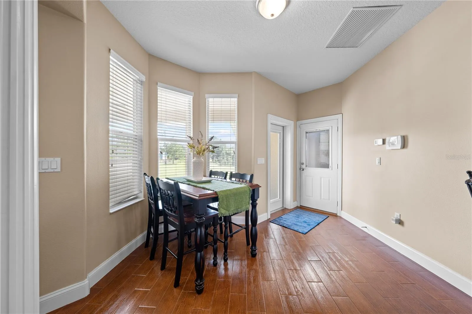 Coffee in the breakfast nook overlooking the backyard.