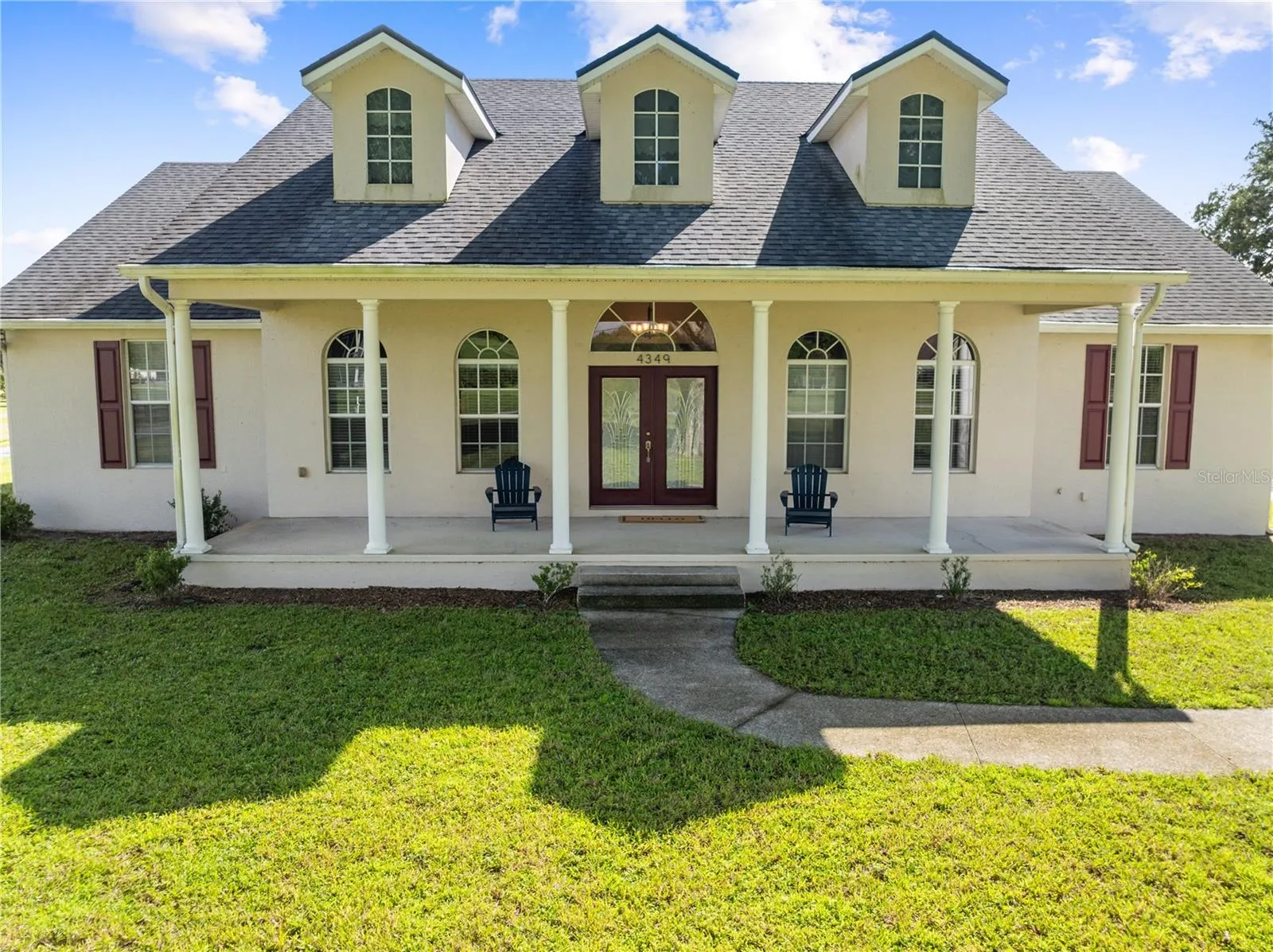 Front Exterior with a 36' x 9' Covered Front Porch