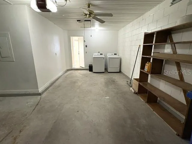 Washer and dryer located in the garage, door leads into the kitchen for easy access.