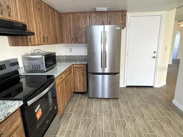 Plenty of cabinet and counter space in this kitchen.