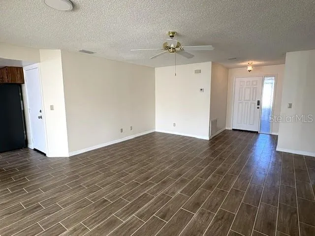 Living area toward front entry.