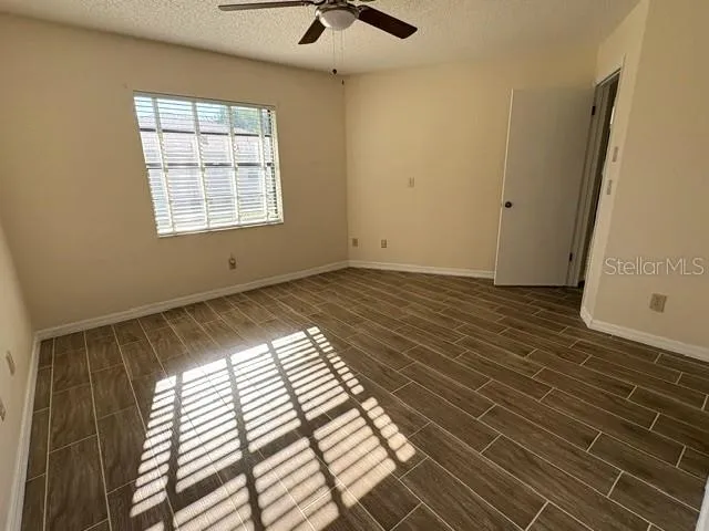 Primary bedroom with great natural light.