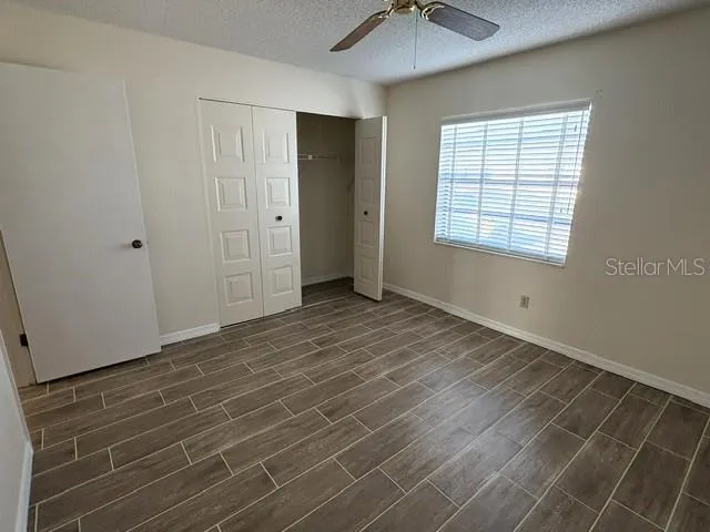 Second bedroom with nice size reach in closet.
