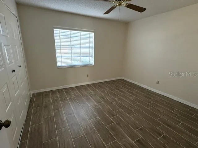 Second bedroom, situated at the front of the home.