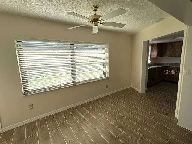 Enclosed lanai is easily accessible from the kitchen.