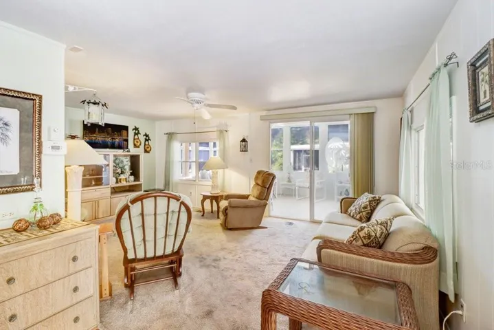 Open Living Room with access to the Front, Sun/Florida Room