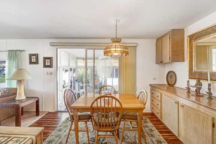 Dining Room with slider to the enclosed lanai