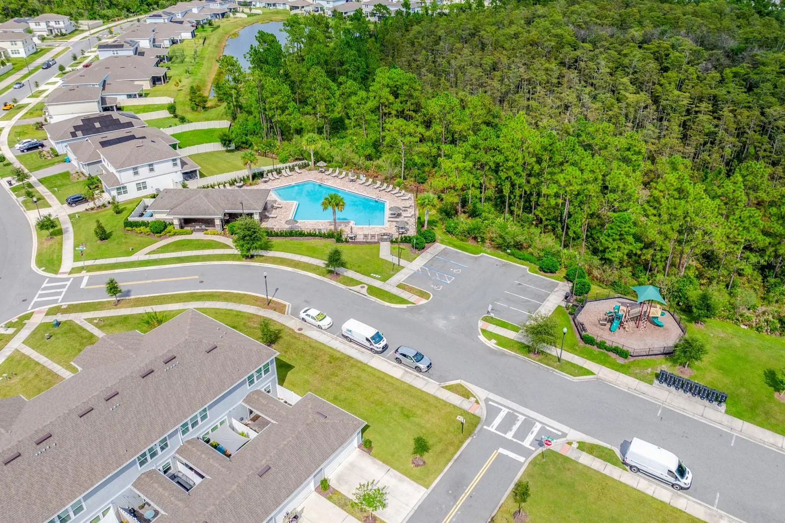 Community pool, playground, and parking