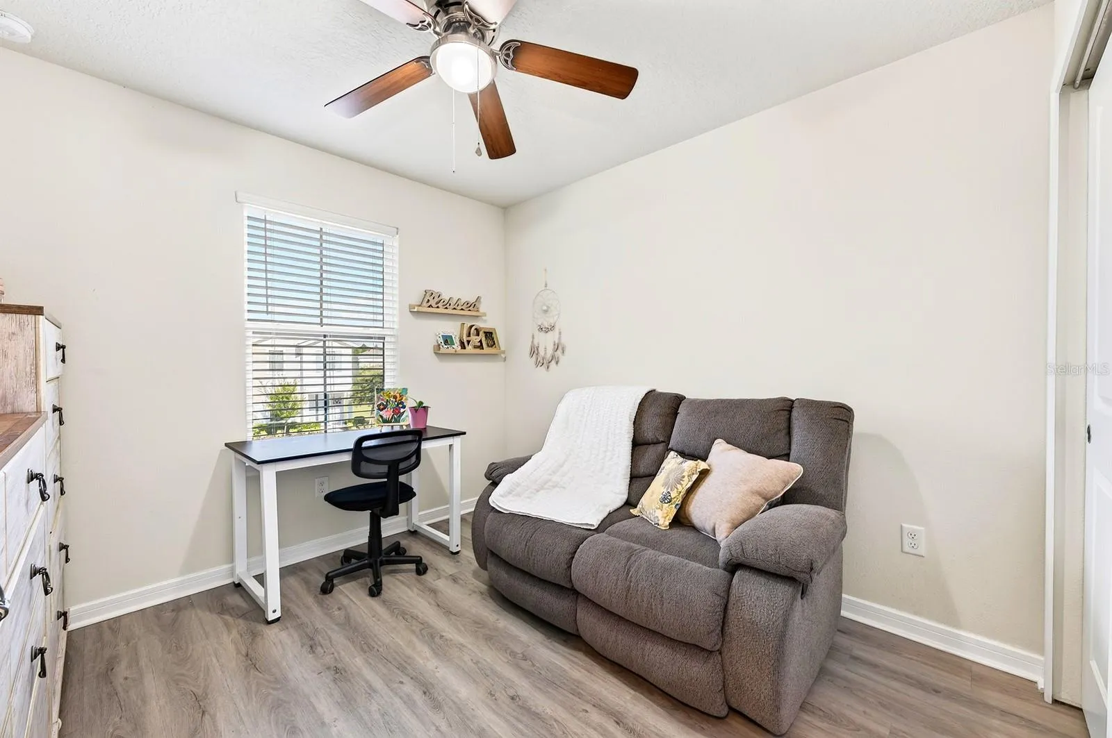 Ceiling fan and great natural light in the 3rd guest bedroom upstairs