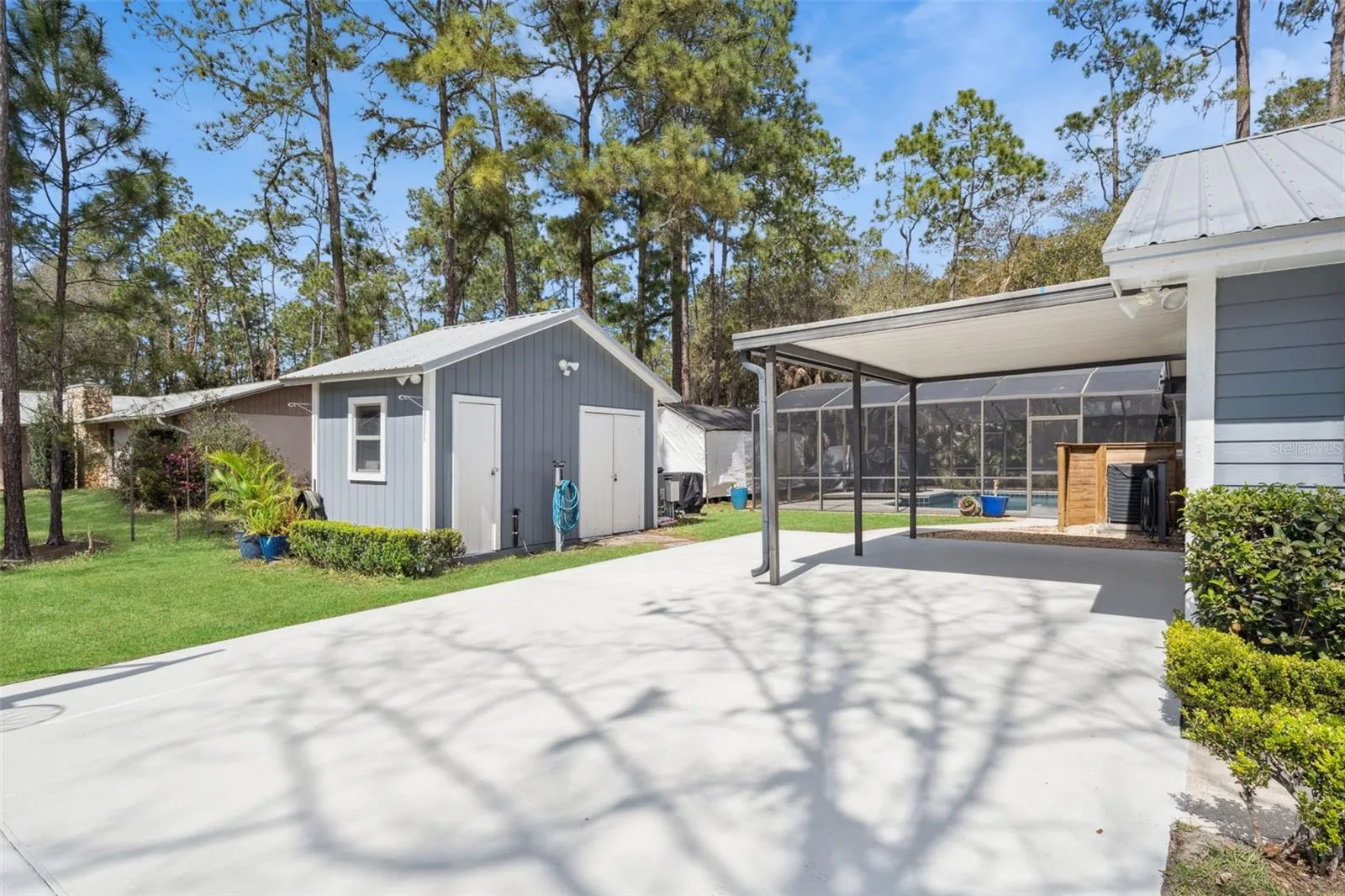 Driveway parking, Carport area and the storage shed.