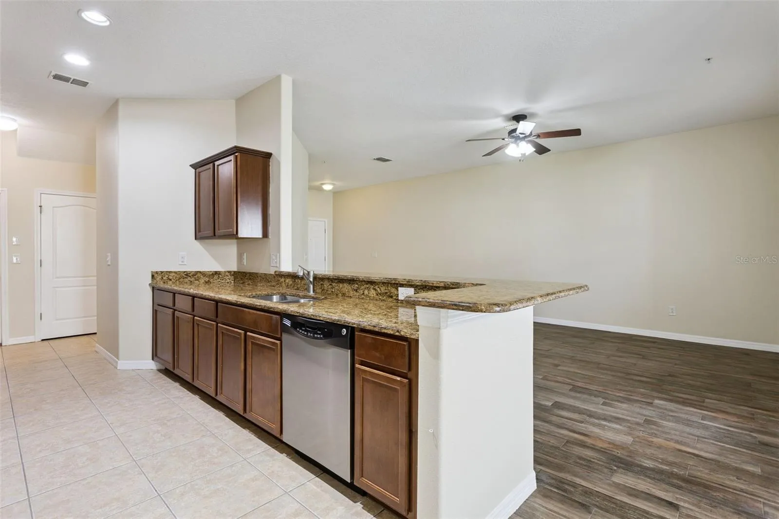 Granite counter tops, wood cabinets, new refrigerator, stainless steal appliances