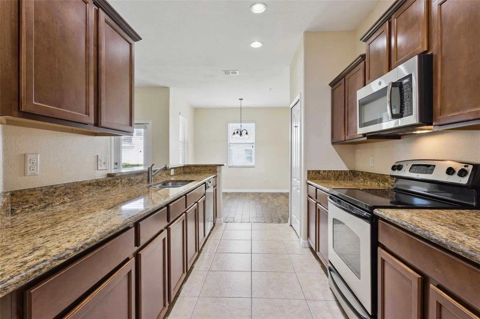 Granite counter tops, wood cabinets, new refrigerator, stainless steal appliances
