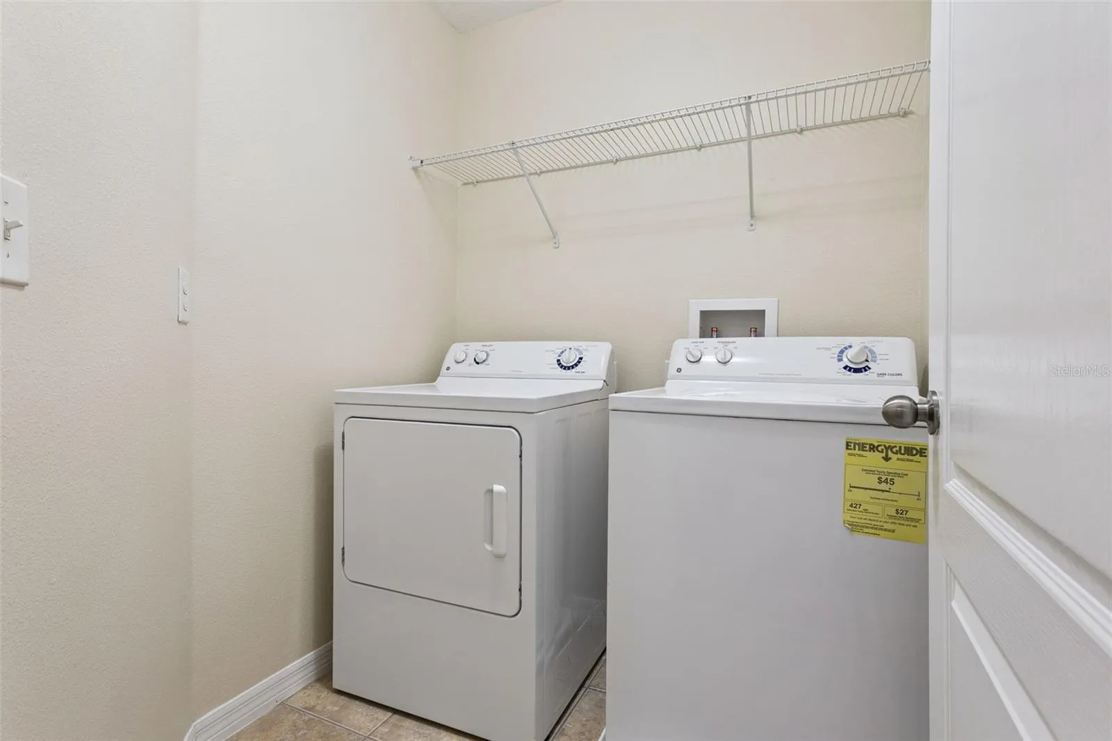 Upstairs Laundry room including washer and dryer