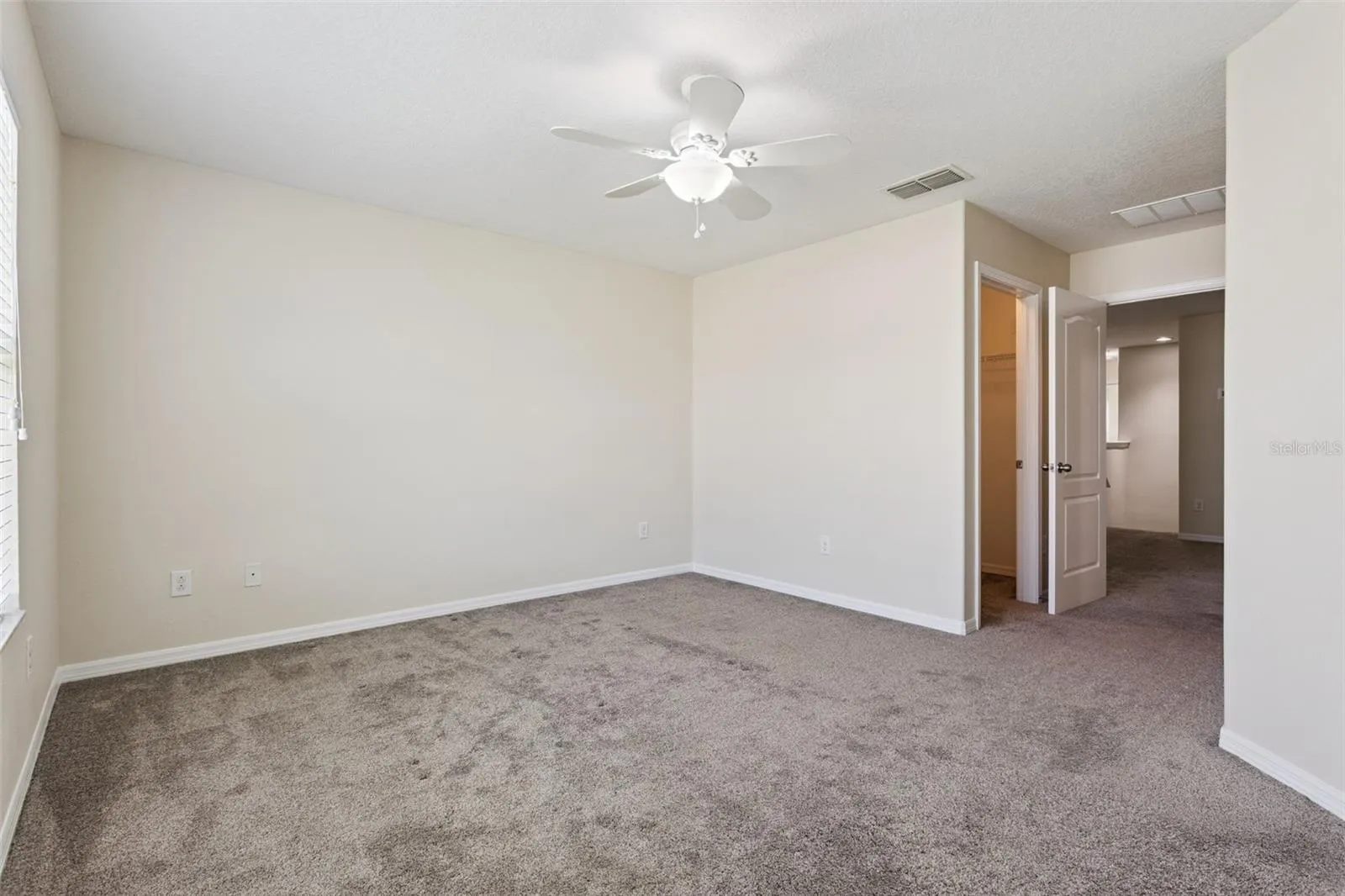 Primary suite with large walk in closet