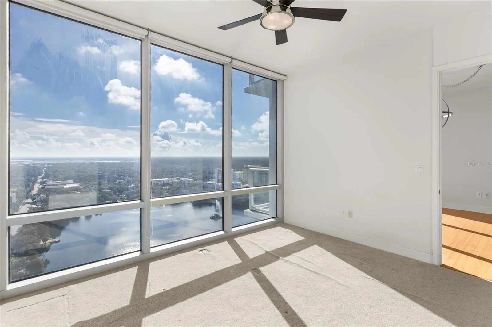 Floor to ceiling windows in primary bedroom