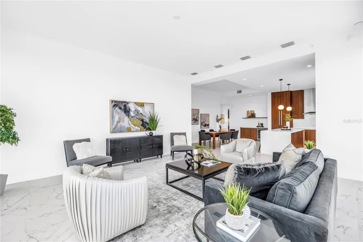 additional foot of ceiling height in great room in our Penthouse Citrine