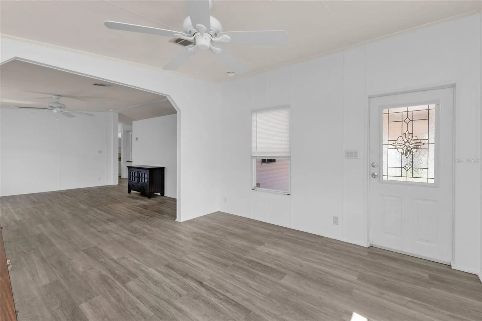 Family room area facing the front entrance into the home.