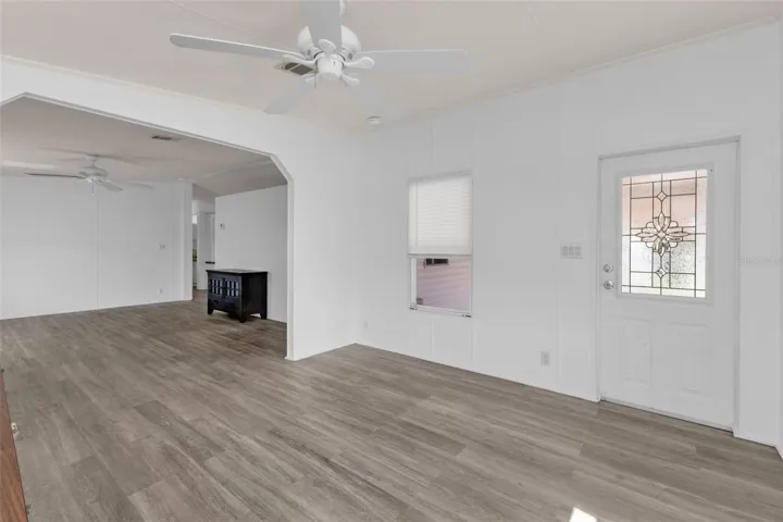 Family room area facing the front entrance into the home.