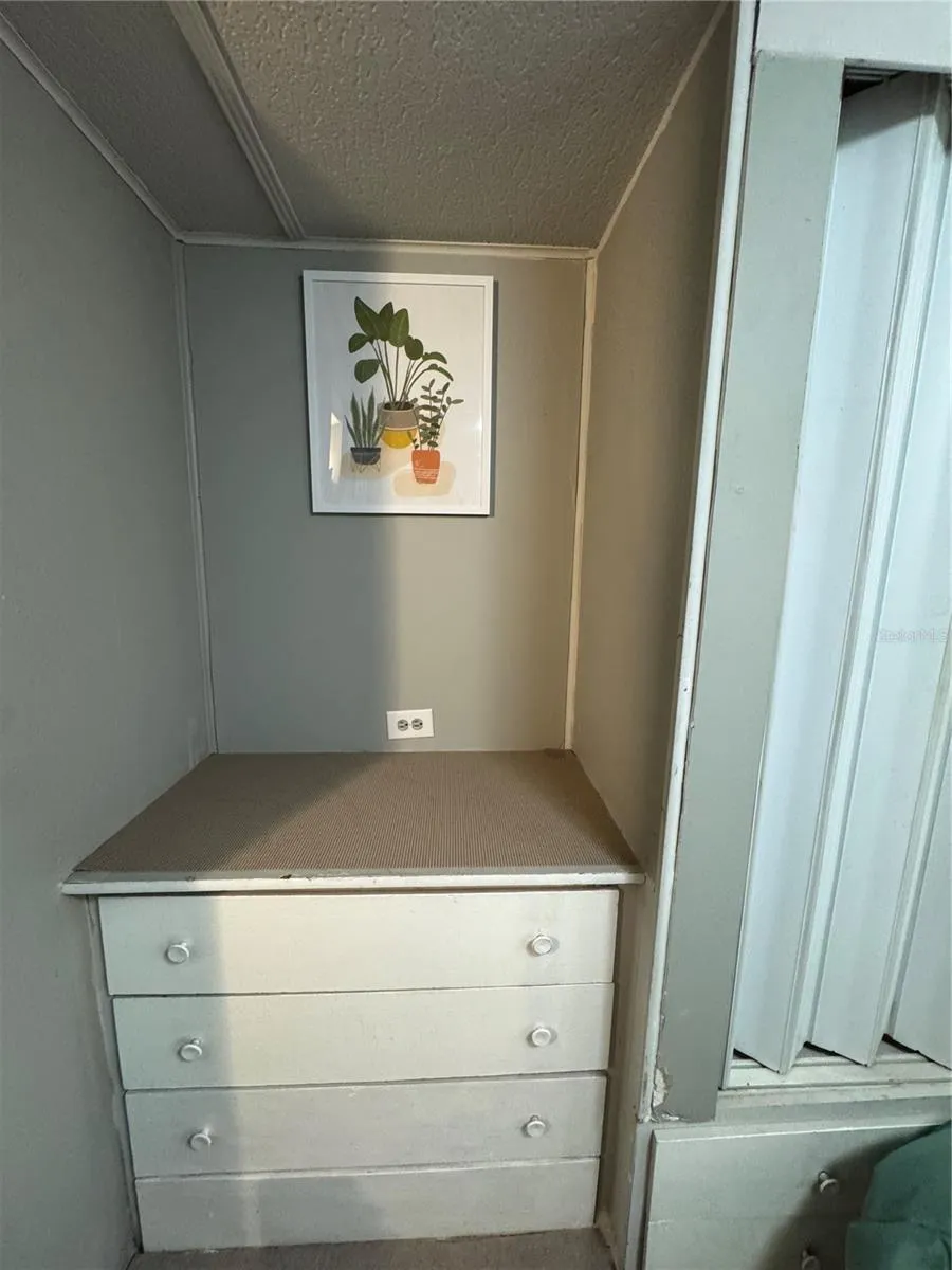 vanity area in secondary bedroom
