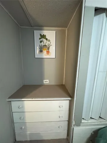 vanity area in secondary bedroom