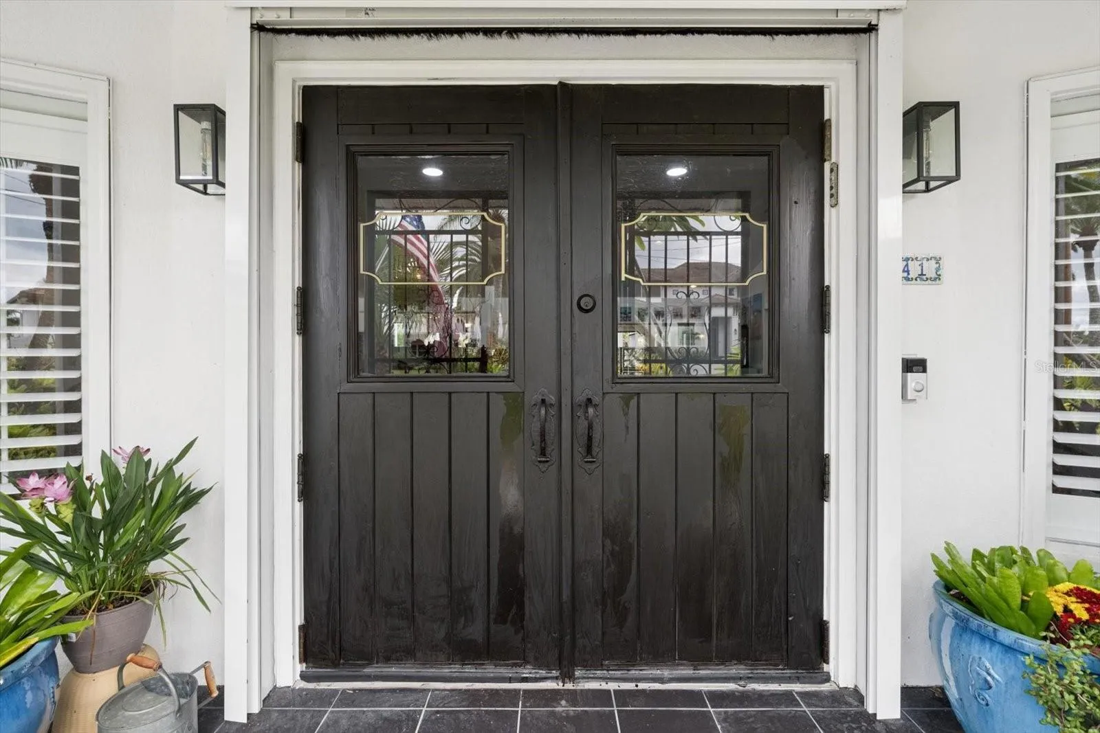 Front Door with automatic roll down hurricane shutter