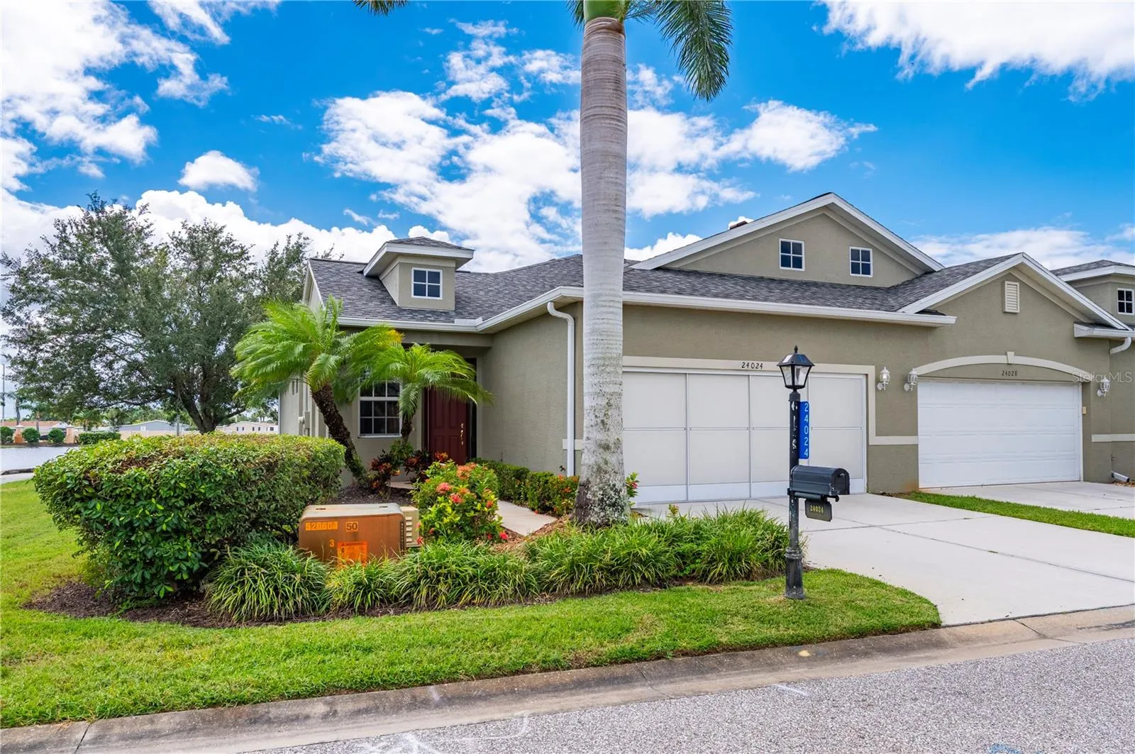 Wide side yard by golf cart path