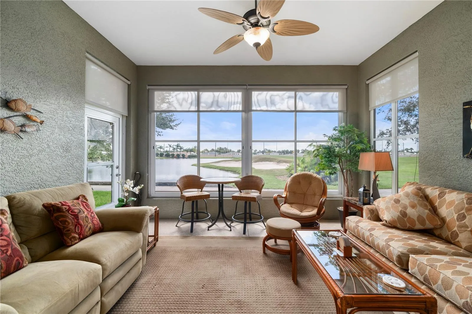 Lanai is enclosed with Acrilic wind-rated tinted windows