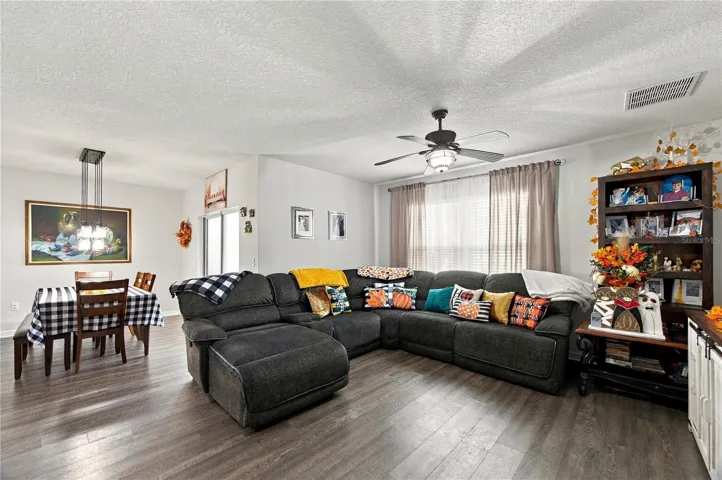 Living room open to kitchen &amp; dining