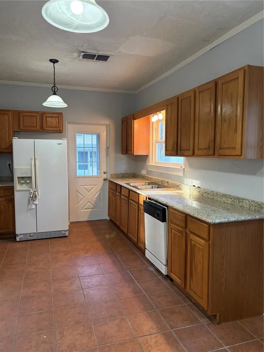 Kitchen Unit A with granite countertops