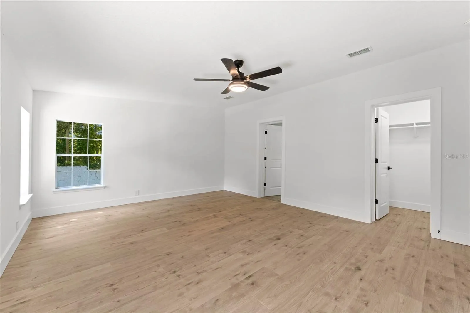 Primary Bedroom with walk in closet