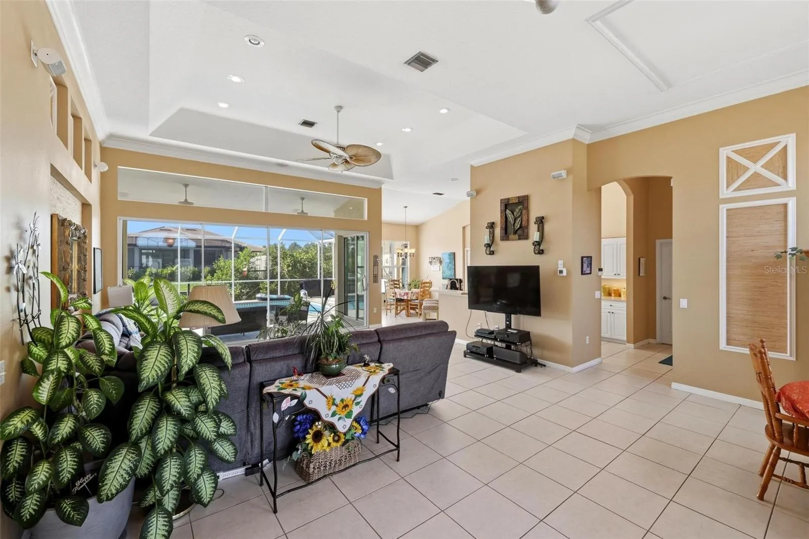 The pocket sliding doors open to the lanai, pool, and waterfront!