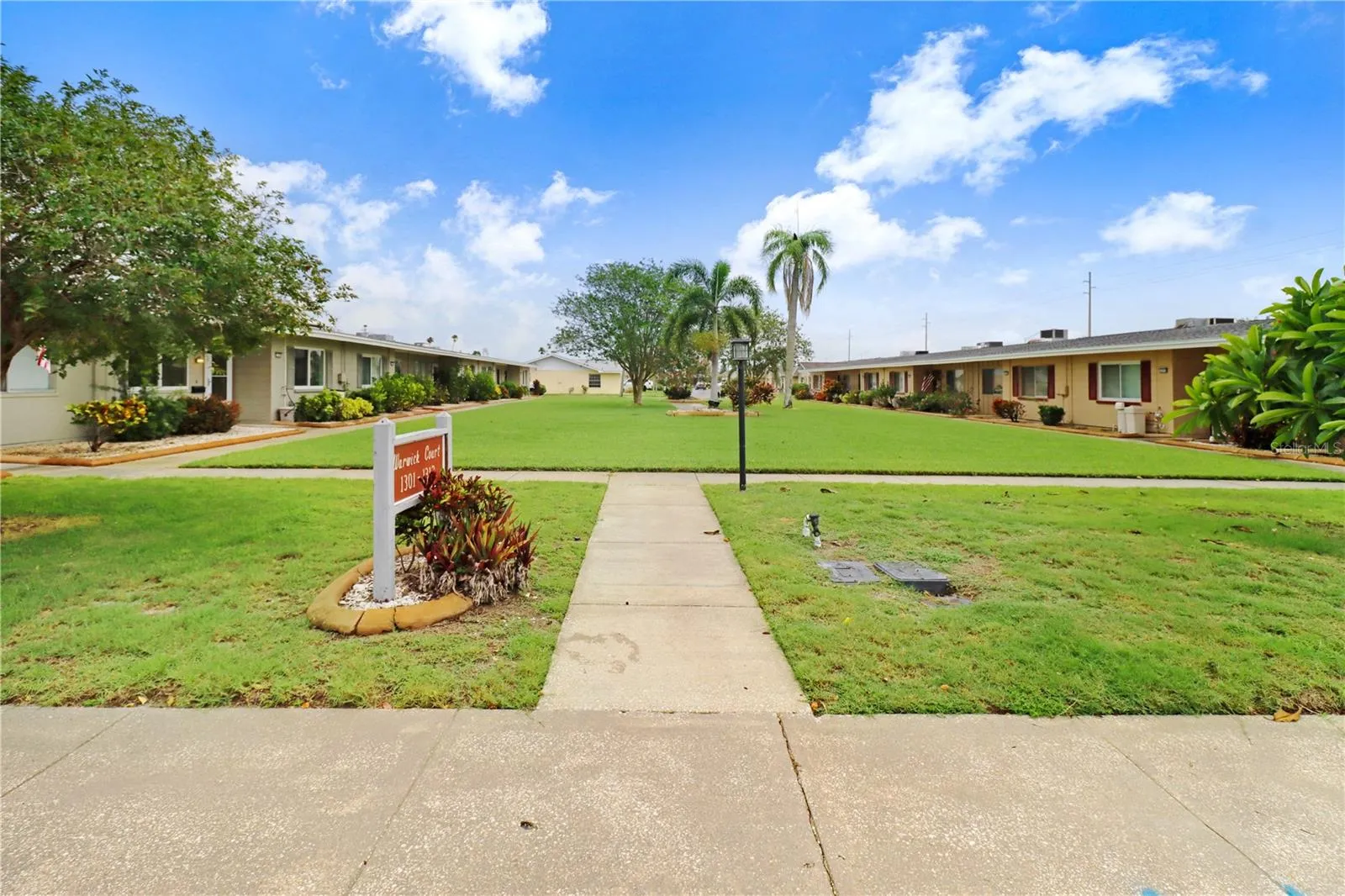 Front Lawn area and walkways at Warwick Court Condominiums.