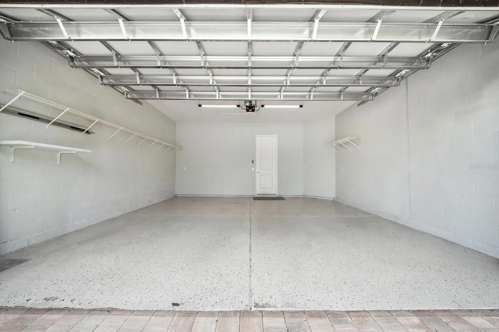 2 CAR GARAGE WITH STORAGE SHELVES