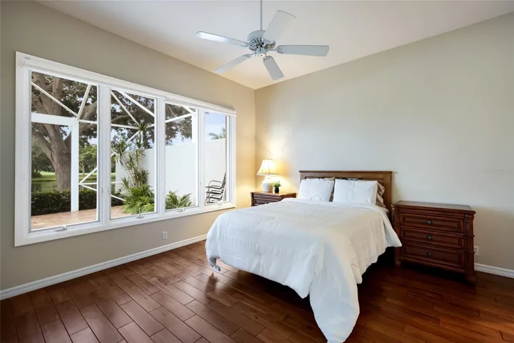 Private primary bedrooms suite in the rear of the home
