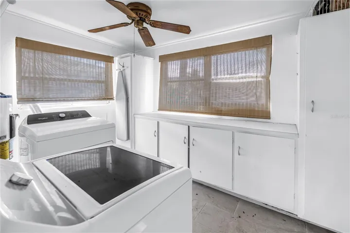 Laundry room accessed through garage